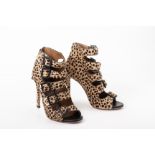 A PAIR OF AQUAZZURA LEOPARD PRINT HEELS EU35