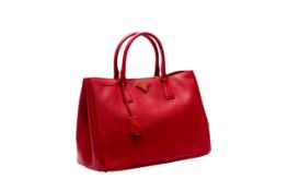 A PRADA RED SAFFIANO LEATHER HANDBAG