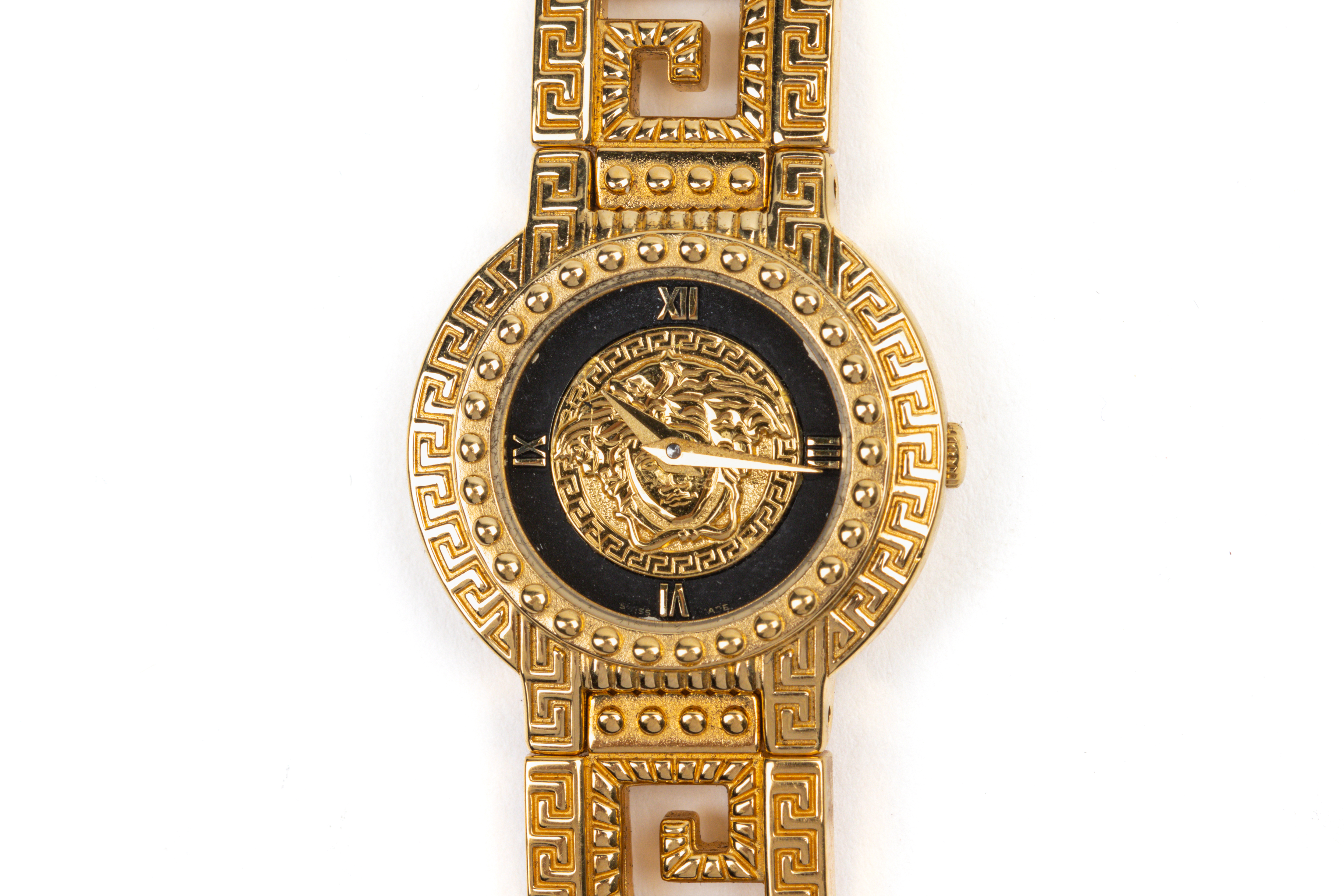 A GIANNI VERSACE SIGNATURE GOLD PLATED BRACELET WATCH