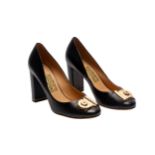 A PAIR OF SALVATORE FERRAGAMO BLACK FIAMMA PUMPS US 9.5