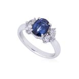 A SAPPHIRE AND DIAMOND RING