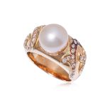 A CULTURED SOUTH SEA PEARL AND DIAMOND RING