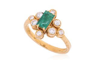 AN EMERALD AND DIAMOND RING