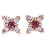 A PAIR OF RUBY AND DIAMOND FLOWERHEAD STUD EARRINGS