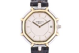 A GERALD GENTA GOLD AND STAINLESS STEEL WATCH