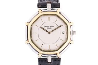 A GERALD GENTA GOLD AND STAINLESS STEEL WATCH