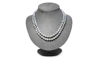 AN AKOYA CULTURED PEARL DOUBLE STRAND NECKLACE