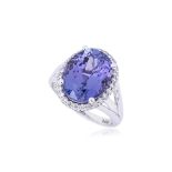 A TANZANITE AND DIAMOND RING