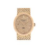 A PATEK PHILIPPE LADIES GOLD 'IOS' BRACELET WATCH