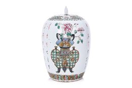 A CHINESE FAMILLE ROSE PORCELAIN JAR AND COVER