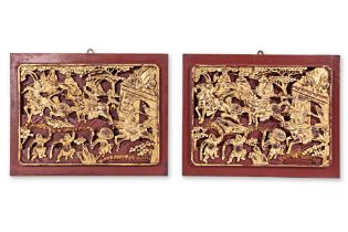 A PAIR OF CARVED AND GILT WOOD PANELS