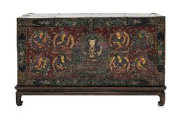 A TIBETAN POYCHROME DECORATED CHEST ON STAND