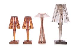 A GROUP OF KARTELL BATTERY TABLE LAMPS