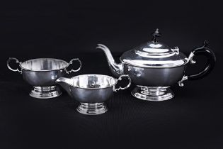 AN ENGLISH SILVER THREE PIECE TEA SERVICE