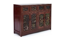 A ROSEWOOD AND BURLWOOD CABINET WITH CARVED PANELS