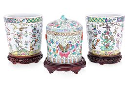 A GROUP OF THREE FAMILLE ROSE PORCELAIN JARS