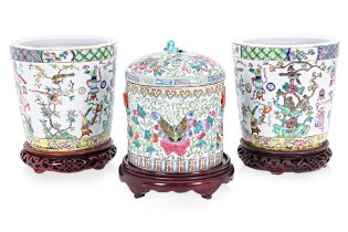 A GROUP OF THREE FAMILLE ROSE PORCELAIN JARS