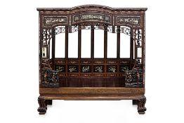 A CARVED AND BONE INLAID OPIUM BED