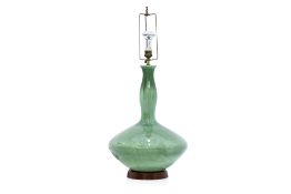 A GREEN-GLAZED CERAMIC TABLE LAMP