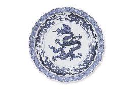 A VERY LARGE BLUE AND WHITE PORCELAIN DRAGON DISH