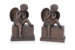 A PAIR OF BRONZE PUTTI BOOKENDS