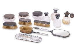 A GROUP OF ENGLISH SILVER MOUNTED DRESSING TABLE ITEMS