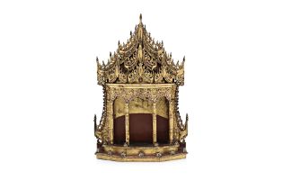 A LARGE BURMESE GILT WOOD AND GLASS INLAID SHRINE