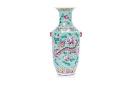 A FAMILLE ROSE TURQUOISE GROUND VASE