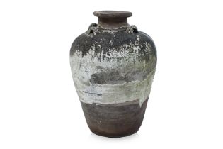 A LARGE SOUTHEAST ASIAN STORAGE JAR