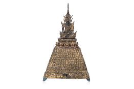 A THAI RATTANAKOSIN GILT BRONZE BUDDHA ON STAND