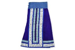 A CHINESE EMBROIDERED PURPLE SILK SKIRT