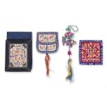 THREE CHINESE SILK EMBROIDERED PURSES AND A HANGING FISH