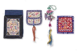 THREE CHINESE SILK EMBROIDERED PURSES AND A HANGING FISH