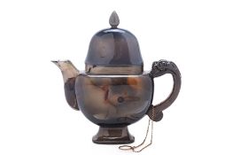 A CARVED AGATE TEAPOT AND COVER
