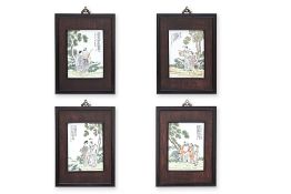 A SET OF FOUR FAMILLE ROSE FIGURAL PLAQUES
