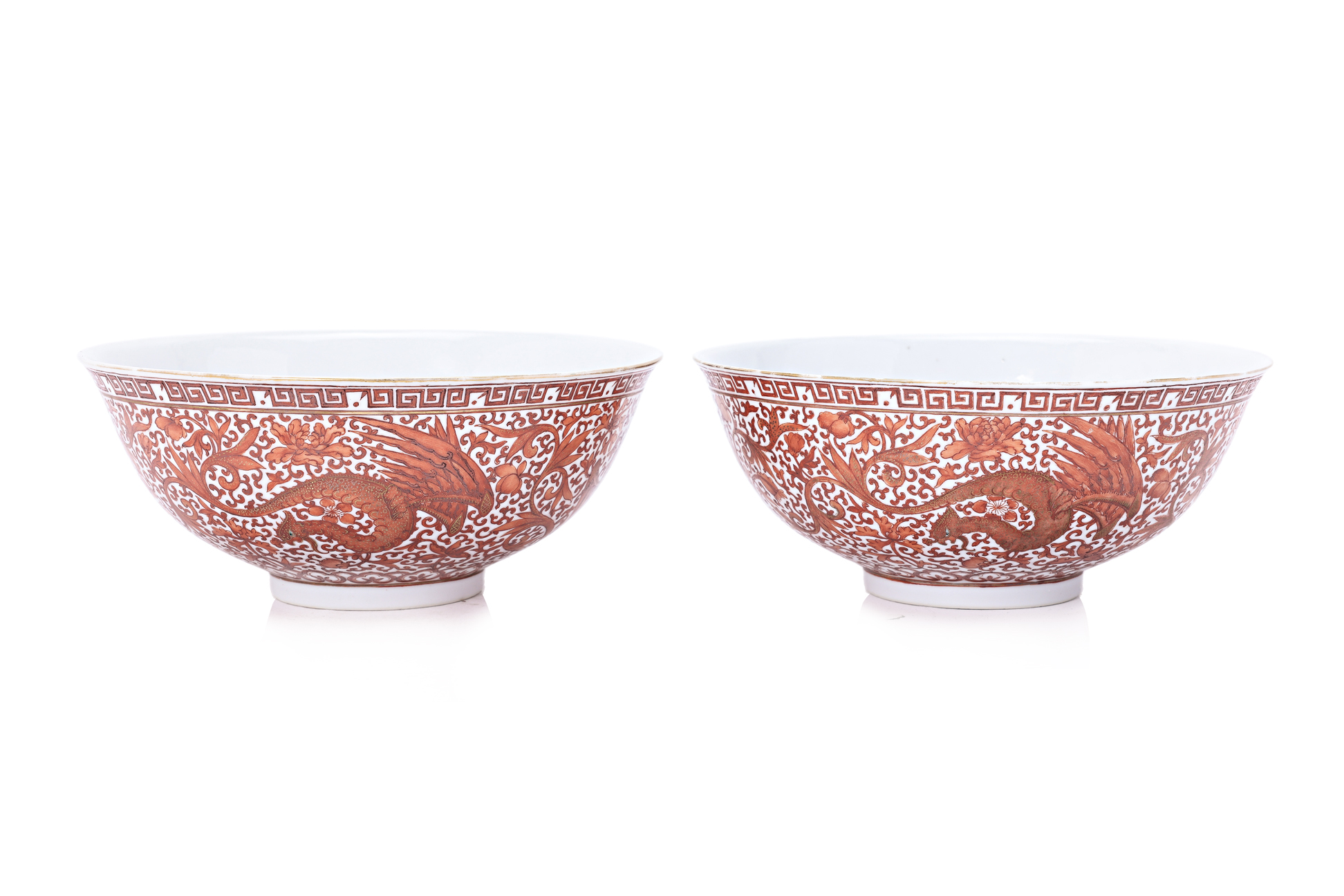 A PAIR OF IRON RED AND GILT PHOENIX PORCELAIN BOWLS