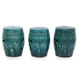 A SET OF THREE TURQUOISE GLAZED BARREL FORM GARDEN SEATS