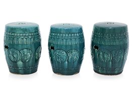 A SET OF THREE TURQUOISE GLAZED BARREL FORM GARDEN SEATS