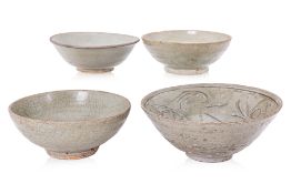A GROUP OF FOUR CHINESE CELADON BOWLS