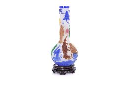 A CHINESE MULTI COLOUR GLASS OVERLAY BOTTLE VASE