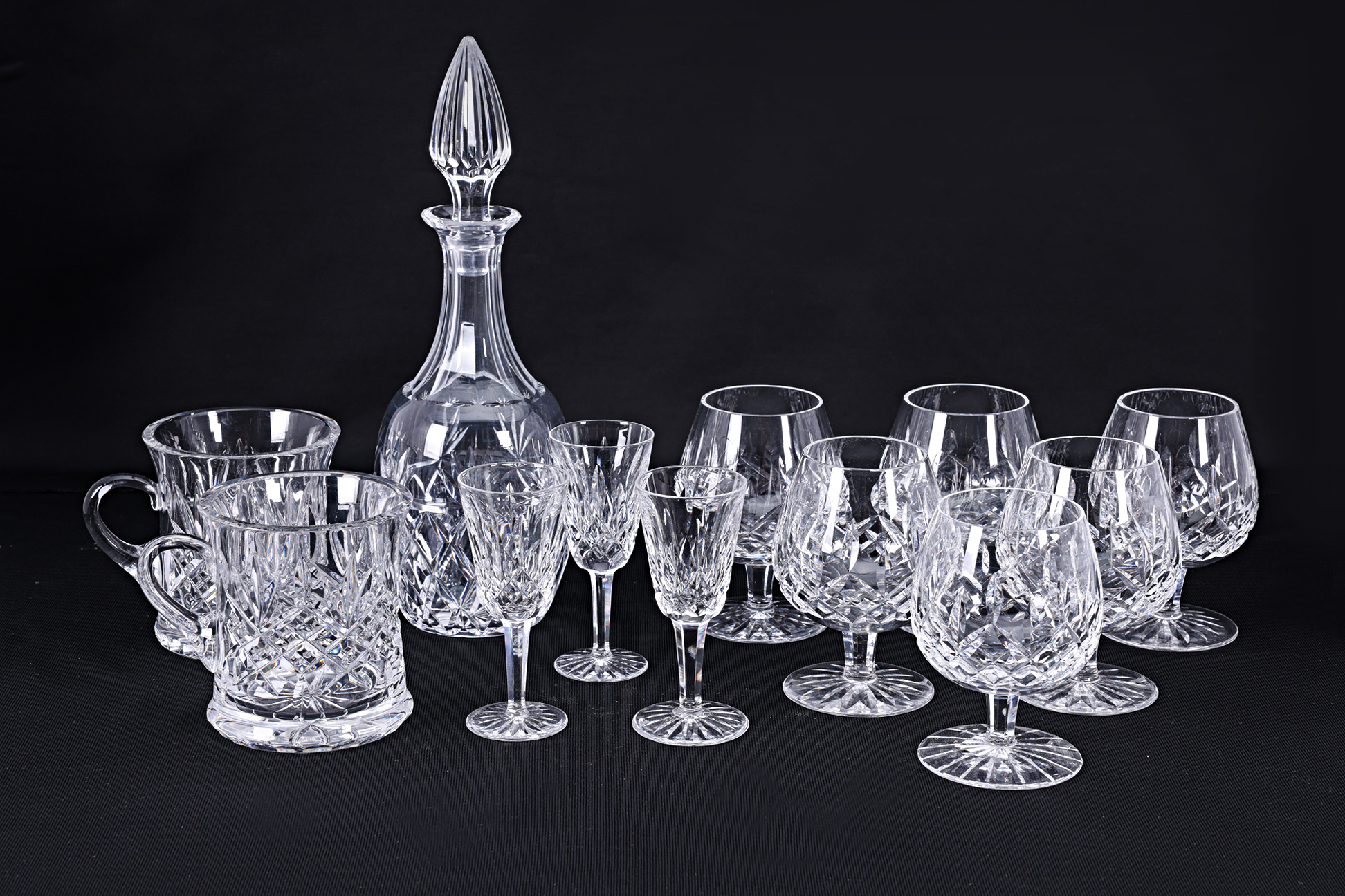 A GROUP OF WATERFORD CRYSTAL AND OTHER TABLE GLASS