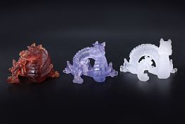 A GROUP OF THREE DAUM GLASS DRAGONS
