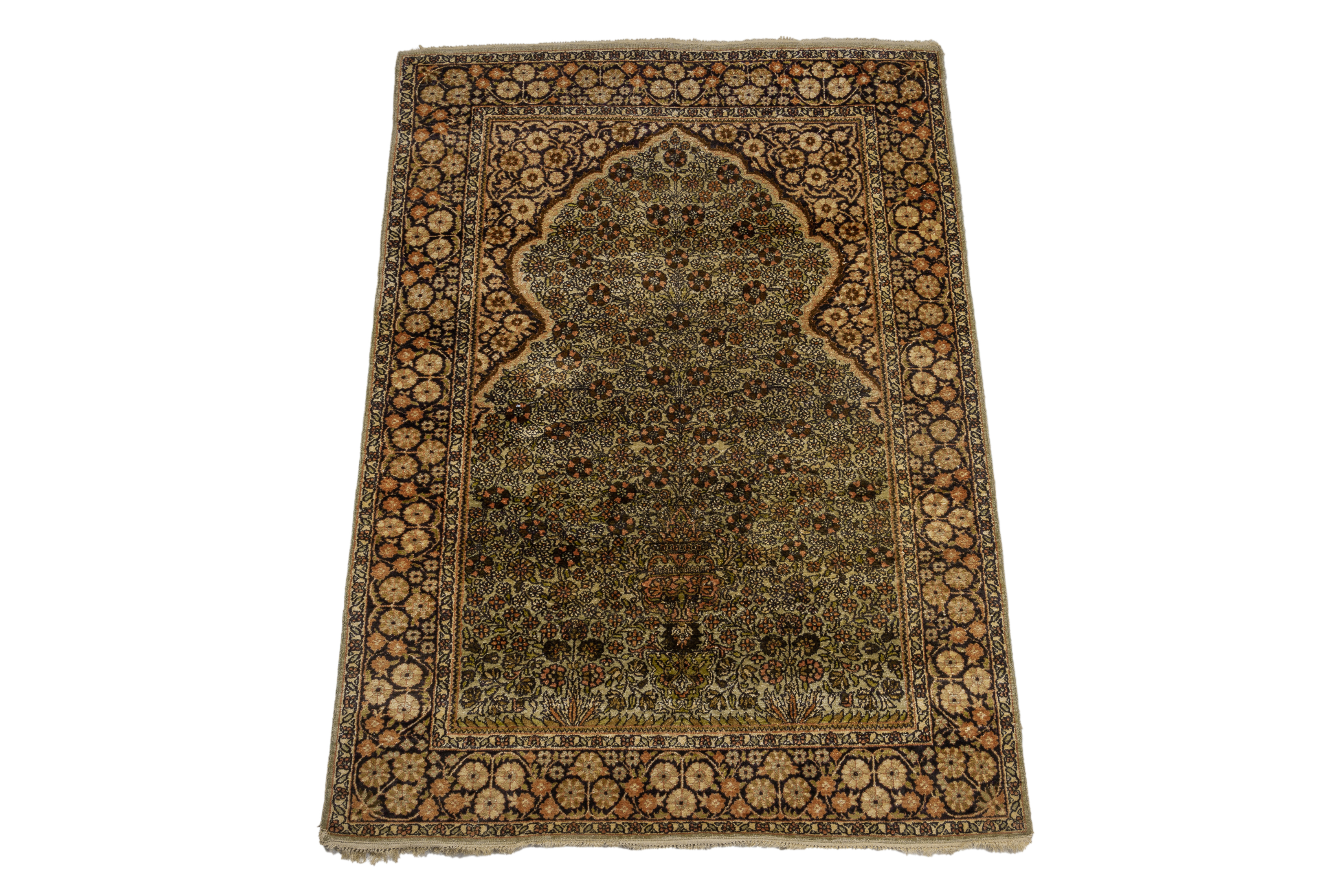 AN INDIAN SILK PRAYER RUG