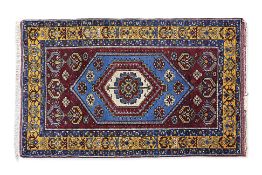 A YAHYALI WOOL RUG