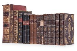AN ASSORTMENT OF ANTIQUE LEATHER BOUND BOOKS
