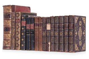 AN ASSORTMENT OF ANTIQUE LEATHER BOUND BOOKS