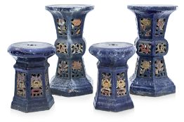 TWO PAIRS OF BLUE GLAZED POTTERY PLANT STANDS