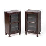 A PAIR OF SMALL ORIENTAL GLAZED HARDWOOD TABLE CABINETS