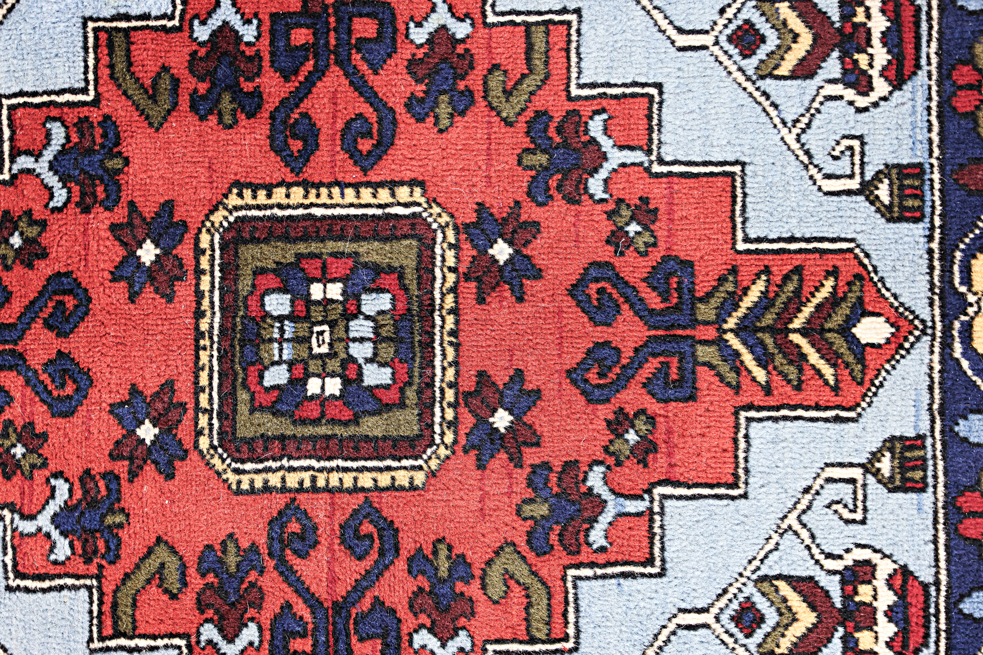 A SMALL SQUARE TIBETAN WOOL RUG - Image 2 of 3