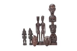 A GROUP OF TRIBAL CARVED WOOD FIGURES AND OTHER ITEMS